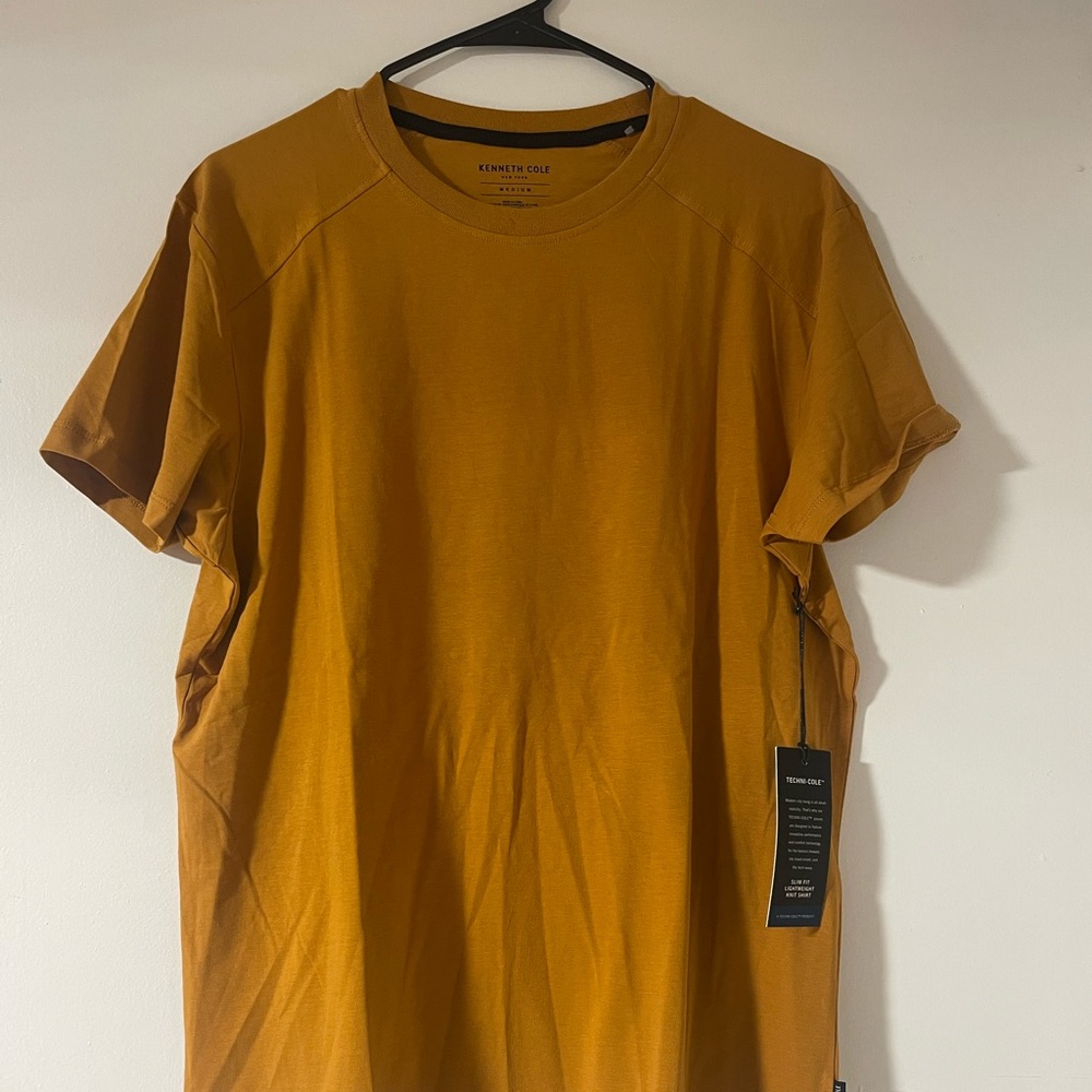 New with tags, really nice thick material, loose fitting size medium
